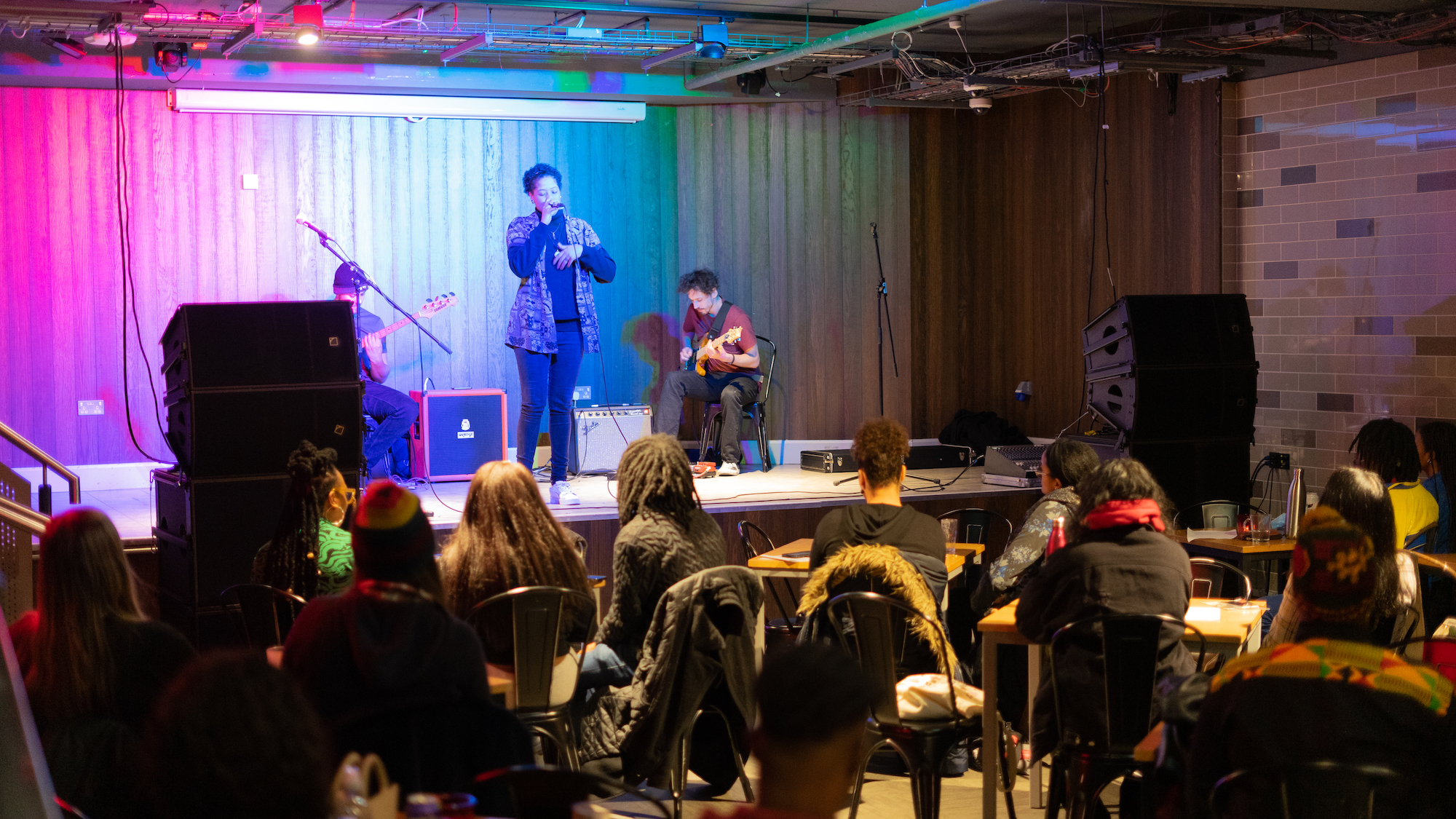 Live music and spoken word at a TAPE event